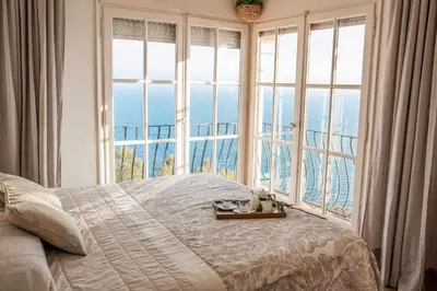 Cama o camas de una habitación en COSTA BRAVA SUITES Villa Bonavida