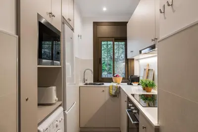 Una cocina o zona de cocina en Apartamento Coquette a 50 metros de la playa
