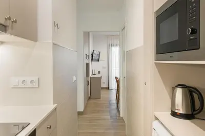 Una cocina o zona de cocina en Apartamento Coquette a 50 metros de la playa