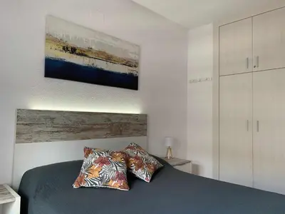 Cama o camas de una habitación en Costa Brava Suites Apartamento Neptuno