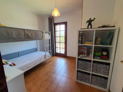 Cama o camas de una habitación en COSTA BRAVA SUITES Casa El Turó de Sagaró