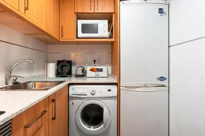 Una cocina o zona de cocina en WELCS APARTAMENTO 130 PDA frente al mar