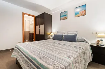 Cama o camas de una habitación en WELCS APARTAMENTO 130 PDA frente al mar