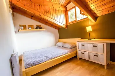 Cama o camas de una habitación en Swiss style villa near Barcelona 10min to beach
