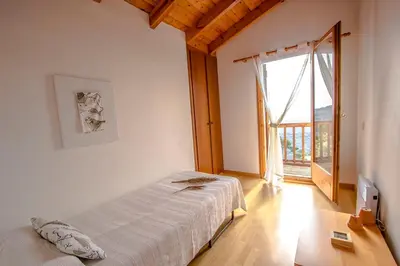 Cama o camas de una habitación en Swiss style villa near Barcelona 10min to beach