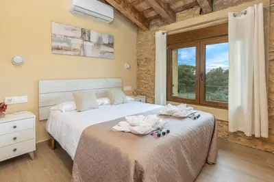Cama o camas de una habitación en Mas Pigem