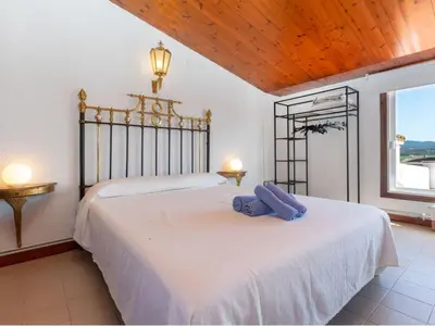 Cama o camas de una habitación en Holiday Home Cataluña by Interhome