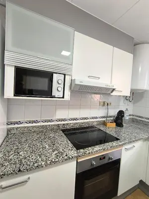 Una cocina o zona de cocina en Refugio en el centro de Palamós