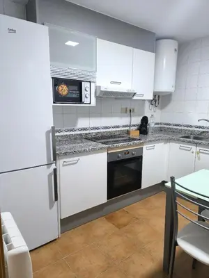 Una cocina o zona de cocina en Refugio en el centro de Palamós