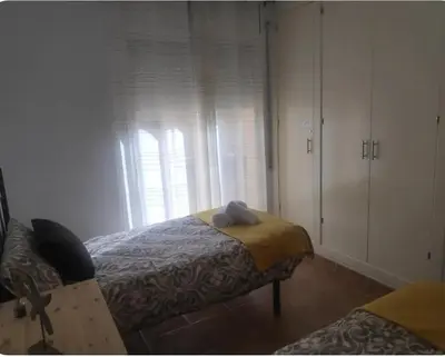 Cama o camas de una habitación en Refugio en el centro de Palamós