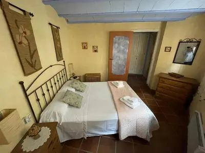 Cama o camas de una habitación en Can Bruguera de Fonteta