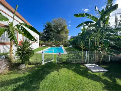Piscina en o cerca de VILLA MasÍa CAL TONI