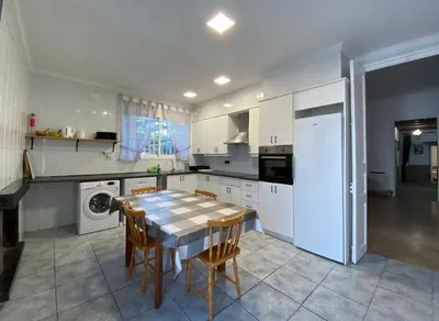 Una cocina o zona de cocina en VILLA MasÍa CAL TONI