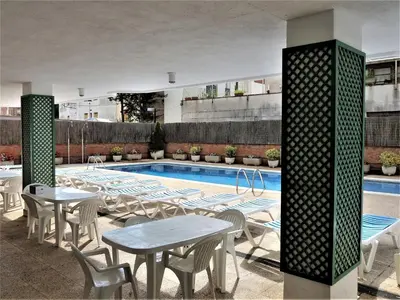Piscina en o cerca de Estudio un solo ambiente céntrico muy cerca de la playa con piscina y terraza