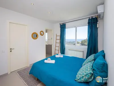 Cama o camas de una habitación en Villa Azalia en Mas Nou Platja d'Aro