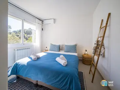 Cama o camas de una habitación en Villa Azalia en Mas Nou Platja d'Aro