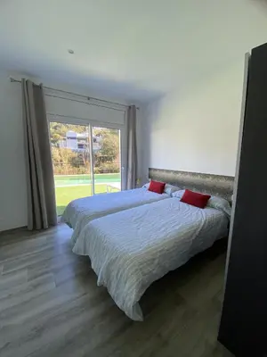 Cama o camas de una habitación en Casa Rio de Oro con piscina con playa y barbacoa