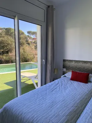 Cama o camas de una habitación en Casa Rio de Oro con piscina con playa y barbacoa