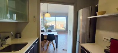Una cocina o zona de cocina en Apartamento Duplex Mar&Pol gran terraza