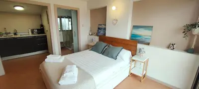 Cama o camas de una habitación en Apartamento Loft Mar&Pol
