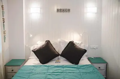 Cama o camas de una habitación en Vista al mar con piscina en S'Agaró