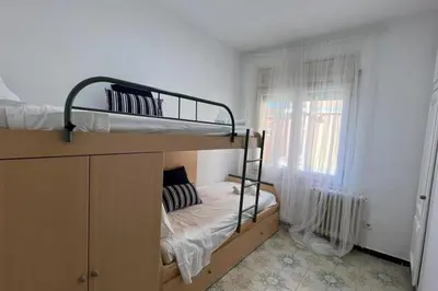 Cama o camas de una habitación en Apartamento en Palamos delante del mar