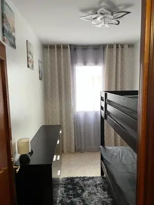 Cama o camas de una habitación en Logement avec vue latérale mer