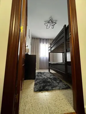 Cama o camas de una habitación en Logement avec vue latérale mer