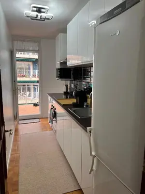 Una cocina o zona de cocina en Logement avec vue latérale mer