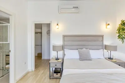 Cama o camas de una habitación en Can Muntaner Duplex