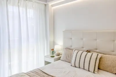 Cama o camas de una habitación en Can Muntaner Duplex