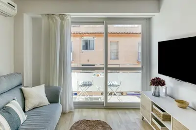 Una televisión o centro de entretenimiento en Can Muntaner Duplex