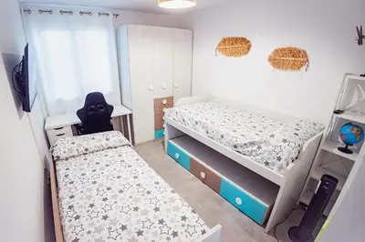 Cama o camas de una habitación en La Mediterranea