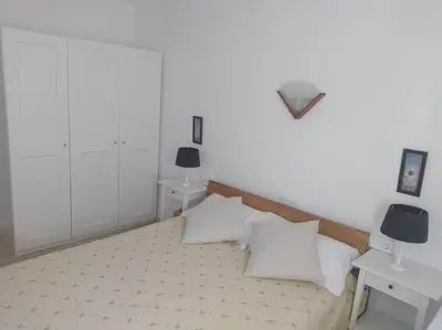 Cama o camas de una habitación en Amplio apartamento Blanes