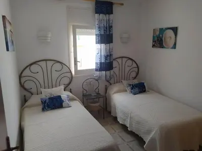 Cama o camas de una habitación en Amplio apartamento Blanes