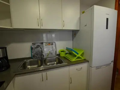 Una cocina o zona de cocina en Apartament Surf Lloret de Mar