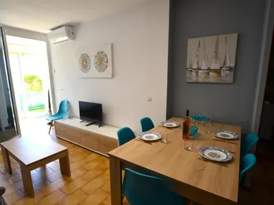 Una televisión o centro de entretenimiento en Apartament Surf Lloret de Mar