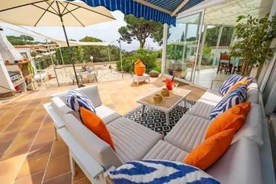 Zona de estar de Valerie's Lux Summer House