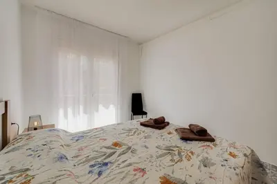 Cama o camas de una habitación en Ba - Carrer Balmes