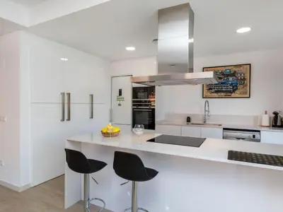 Una cocina o zona de cocina en Holiday Home Sa Riera White on the Beach by Interhome