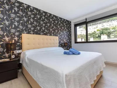 Cama o camas de una habitación en Holiday Home Sa Riera White on the Beach by Interhome