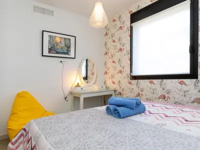 Cama o camas de una habitación en Holiday Home Sa Riera White on the Beach by Interhome