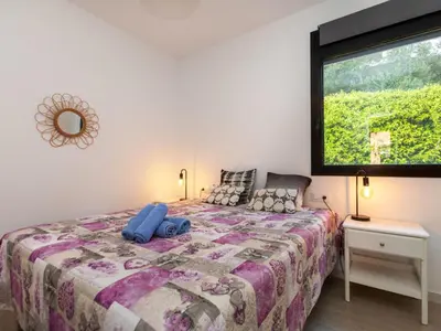 Cama o camas de una habitación en Holiday Home Sa Riera White on the Beach by Interhome