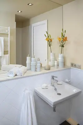 Un baño de Hotel Mar de Tasmània - Auto Check-in