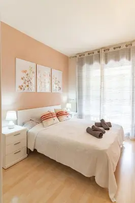Cama o camas de una habitación en Charming Garden Apartment en 