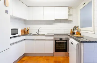 Una cocina o zona de cocina en Apartamento Calella Park parking y piscina - WeHost Costa Brava