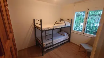Cama o camas de una habitación en SA RIERA Begur, 200 m walk to sa Riera beach