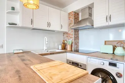 Una cocina o zona de cocina en Apartamento de lujo con vistas al mar, a dos minutos de la playa