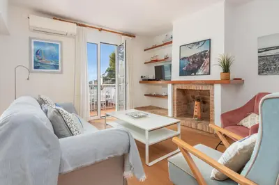 Zona de estar de I Apartamento frente al mar en playa Tamariu