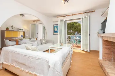 Cama o camas de una habitación en II Apartamento frente al mar en Tamariu